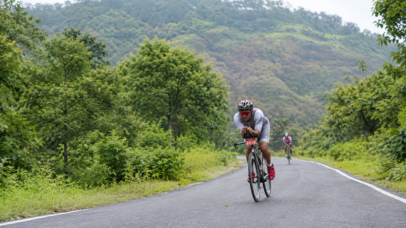 Cyclist leaning through a high-speed mountain switchback